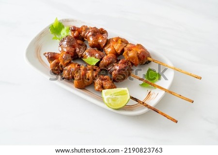 grilled chicken gizzard skewer with herbs and spices on plate ストックフォト © 