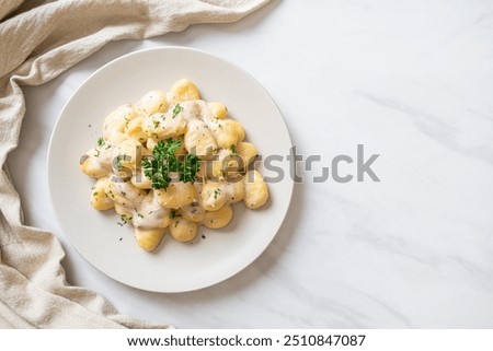 Similar – Image, Stock Photo Dumplings with mushroom sauce