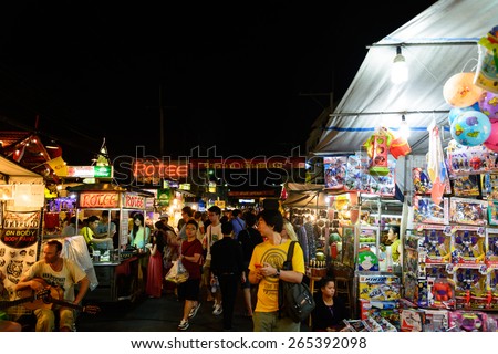 HUA HIN, THAILAND - FEB 02 2015: Tourists stroll at the night market in Hua Hin. The famous night market in Hua Hin is a major tourist attraction.