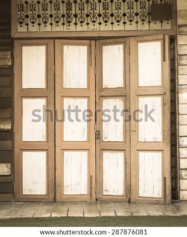 old door with film texture in vintage style
