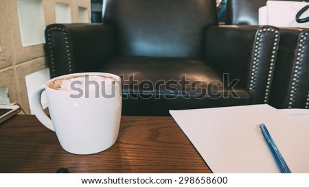 coffee cup in coffee shop - vintage effect picture