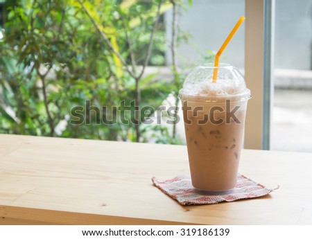 iced milk tea on wood table