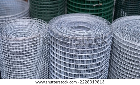 Wire in rolls, garden supplies, wire fences Foto stock © 