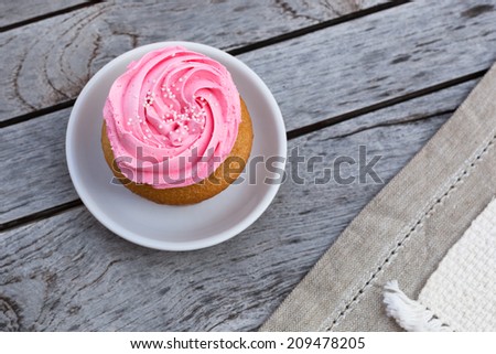 Delicious Cupcakes on table linens