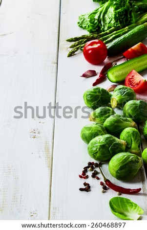 Healthy Organic Vegetables on White Wooden Background. Healthy food, diet or cooking concept.