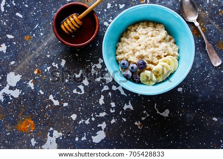 Similar – Image, Stock Photo Hot porridge with frozen blueberries