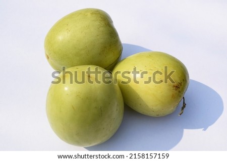 Fresh and organic Indian fruit called Green jujube or Apple jujube or Ber apple. Green Indian jujuba plum bora on white background Stock fotó © 
