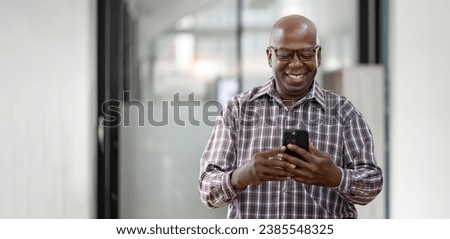 Similar – Image, Stock Photo Black man using smartphone on street