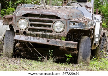 Broken and  rusty  car in the junk yard