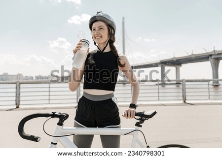 Similar – Image, Stock Photo Positive female cyclist resting on street