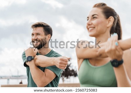 Image, Stock Photo Attractive sporty woman working out at home, doing pilates exercise in front of television in her small studio appartment. Social distancing. Stay healthy and stay at home during corona virus pandemic