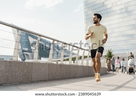 Image, Stock Photo Athletic man doing exercise at the beach.