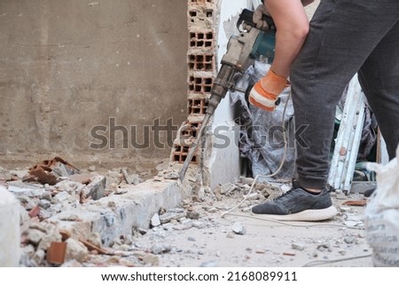 Similar – Image, Stock Photo Unrecognizable handyman using machine on factory