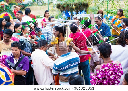 SUNGAI PETANI, Malaysia - JANUARY 17: Hindu devotee taking part in the Thaipusam festival on January 17, 2014 in Malaysia. Hindu festival to worship God Muruga.