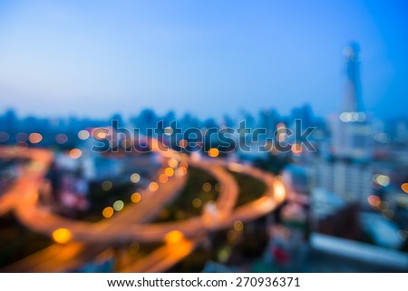 Blur bokeh of Bangkok city expressway before sunrise