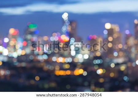 Blured lights of bokeh city skyline during twilight