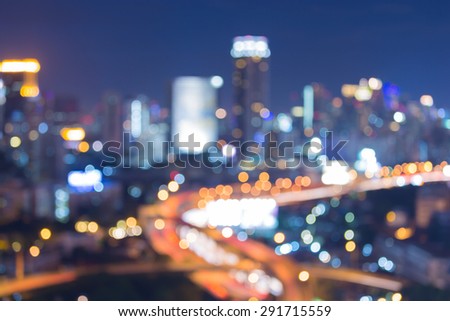 Abstract blur bokeh lights big city highway during blur hour