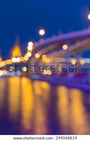 Abstract blurred bokeh light,highway intersection and the bridge waterfront