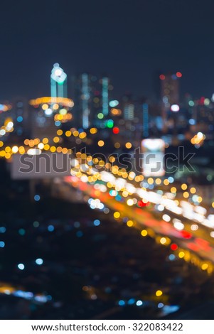 Abstract blurred bokeh lights city road at night