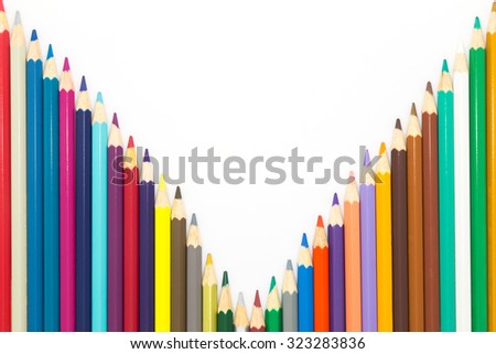 Line of rainbow colours wooden pencil on white background