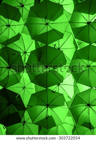 green umbrellas. color umbrellas urban decoration.