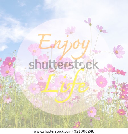 blurred autumn background with inspirational  typographic quote - Enjoy your life.