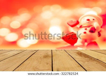 Empty perspective room over blurred Christmas decoration background,Template mock up for display of your product for Christmas Holiday.
