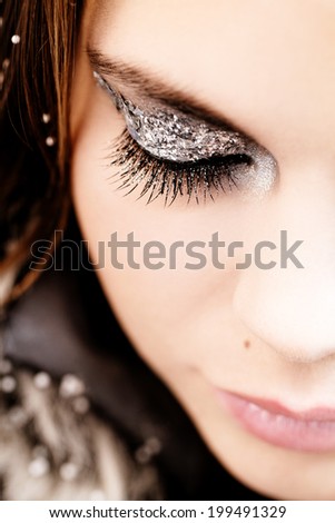 Beautiful silvery and glittery party makeup