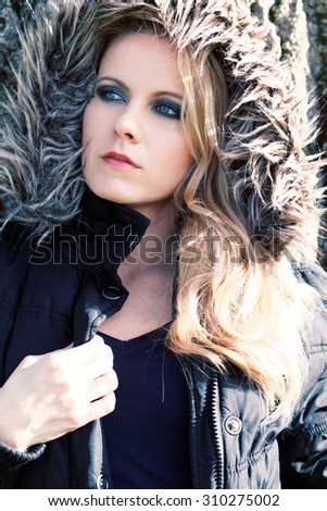 Fashionable stylish woman in jacket at winter