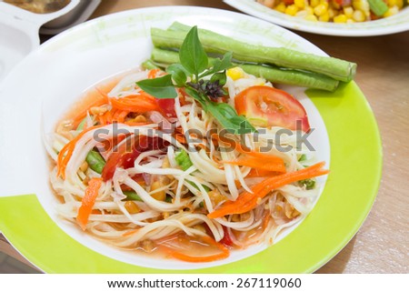 Thai papaya salad or Som Tum, traditional and modern thai food