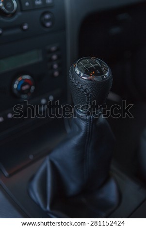 Detail interior of modern auto. Gear shift in car.