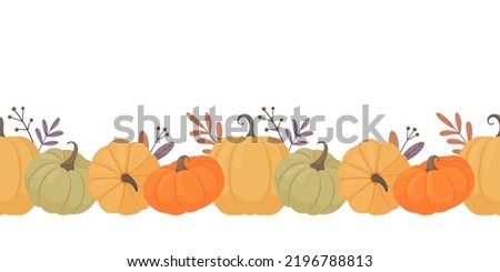 Pumpkin seamless border. A variety of colorful pumpkins and autumn leaves on a white background.