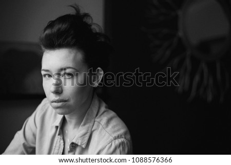 Closeup black and white portrait of beautiful sexy edgy young caucasian woman european female with Closeup black and white portrait of beautiful sexy edgy young caucasian woman european female with
