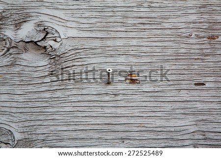 wooden board planks fence with lines, kinks, curves, texture background, rough surface