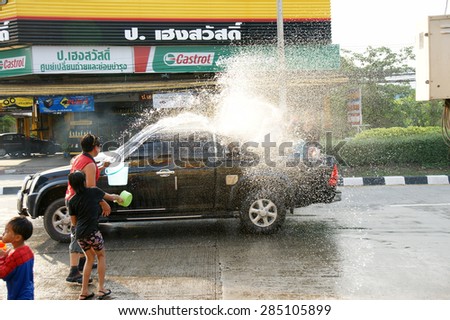CHIANGMAI,THAILAND-APRIL 14, 2011:Unidentified tourist with pickup car in a water fight festival or Songkran Festival (Thai New Year), on April 14, 2011 in Chiangmai, Thailand.
