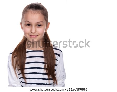 Similar – Image, Stock Photo Little girl, eight years old, sitting on the grass outdoors.