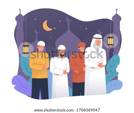 Muslim people perform tarawih prayer at night during ramadan