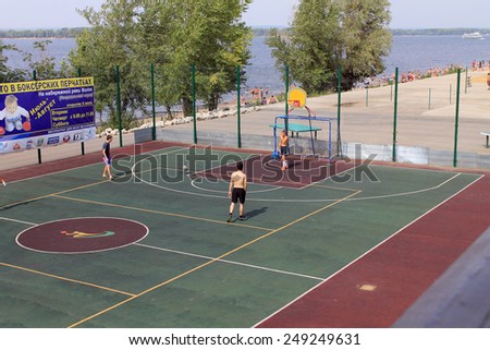 Samara, Russia - August 23, 2014: strangers on the Playground playing ball in Samara, Russia - August 23, 2014.