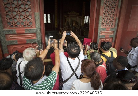 The Forbidden City in Beijing, China/Beijing, China - August 4, 2014: Tourists are visiting The Forbidden City in China\'s capital Beijing.
