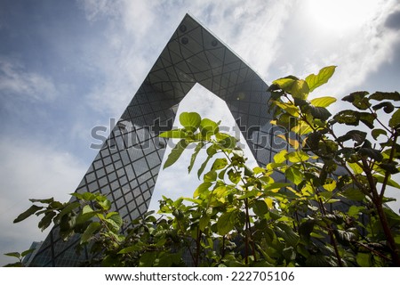 Beijing, China - August 5, 2014: The 44-storey skyscraper of China Central Television (CCTV) building on East Third Ring Road is seen from below in Beijing, China.