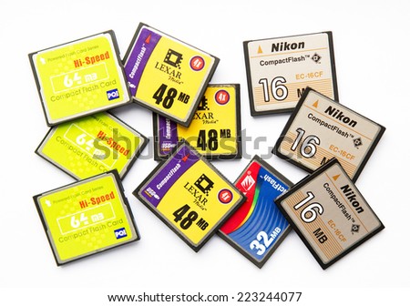 Sofia, Bulgaria - July 22, 2014: Multiple Compact flash memory cards on white background.