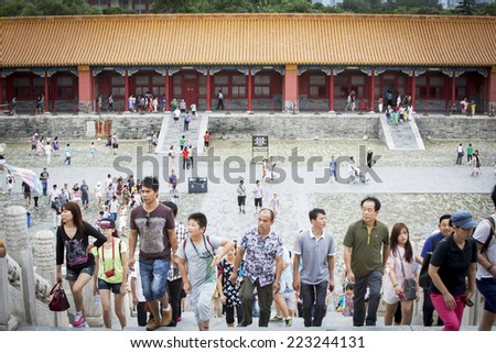Beijing, China - August 4, 2014: Tourists are visiting The Forbidden City in China's capital Beijing.