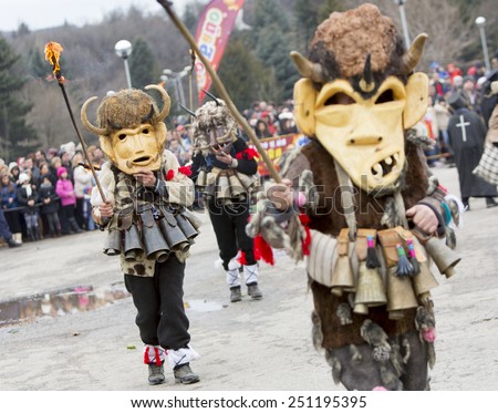 Pernik, Bulgaria - January 31, 2015: Participants are participating in the International Festival of Masquerade Games Surva. The festival promotes variations of ancient Bulgarian and foreign customs.