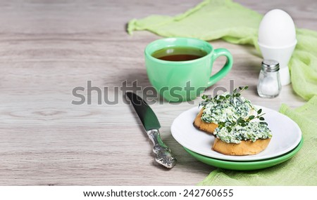 Toast with cheese and spinach, egg and coffee for breakfast. Space for text