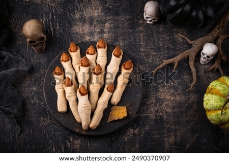 Similar – Image, Stock Photo Cookies fingers and pumpkin hummus