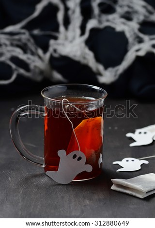 Halloween tea with ghost tea bag. Selective focus