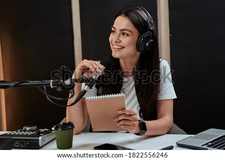 Similar – Image, Stock Photo Positive female radio host in studio