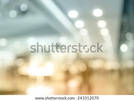 Blurred supermarket store background with circle bokeh light.