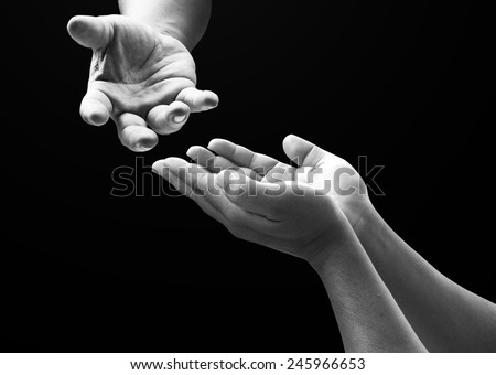 Two people open empty hands with palms up.