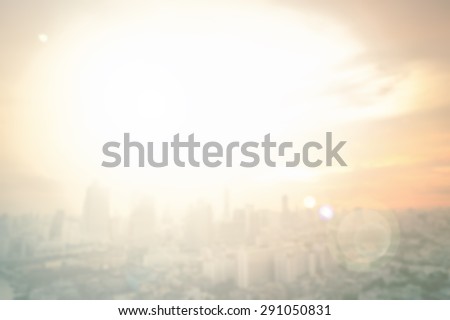 Vintage style. Blurred sunrise over city background with circle light. blur background concept.